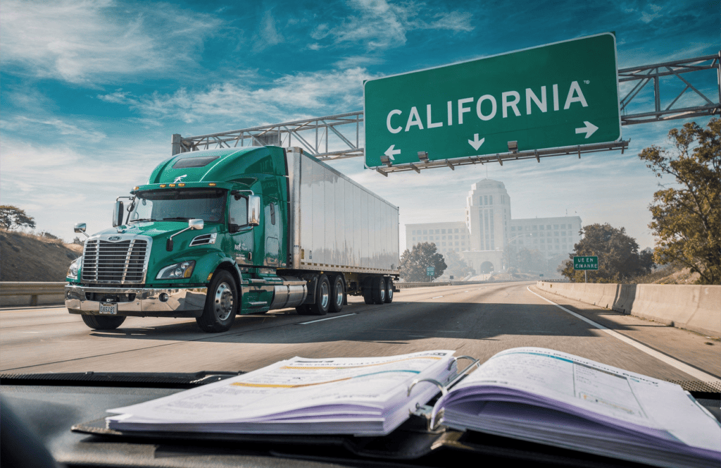 Semi truck driving under a California highway sign with CDL paperwork visible, illustrating regulatory scrutiny over the non-domiciled CDL reissue plan
